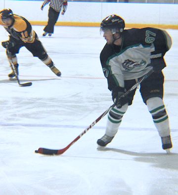 Brett Catto of the Wolves lines up a shot against Milverton in Game 3 at the Ripley Arena